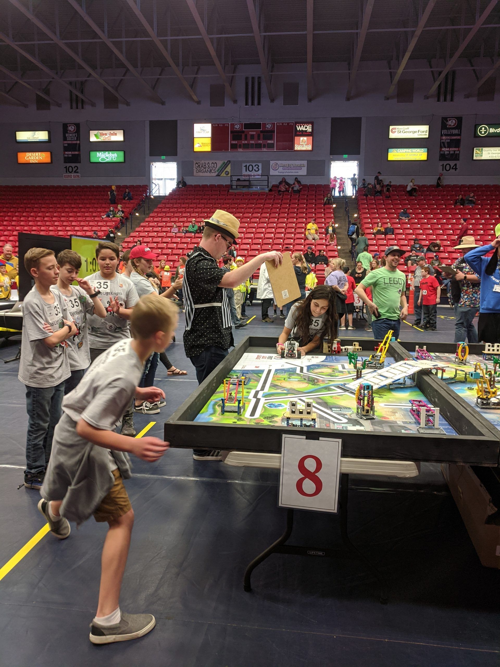 Students around competition table for Lego Robotics